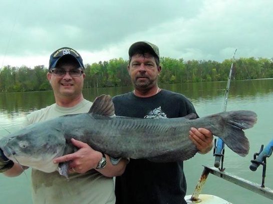 U.S. Army SSG Brian K. Pearce with Capt. Archie Catfish caught on October 2, 2012